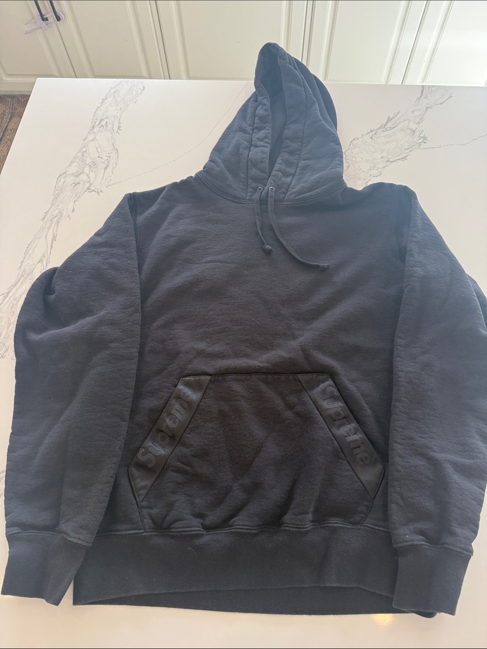 Authentic Supreme Black Hoodie with Embossed Pocket and hood supreme print